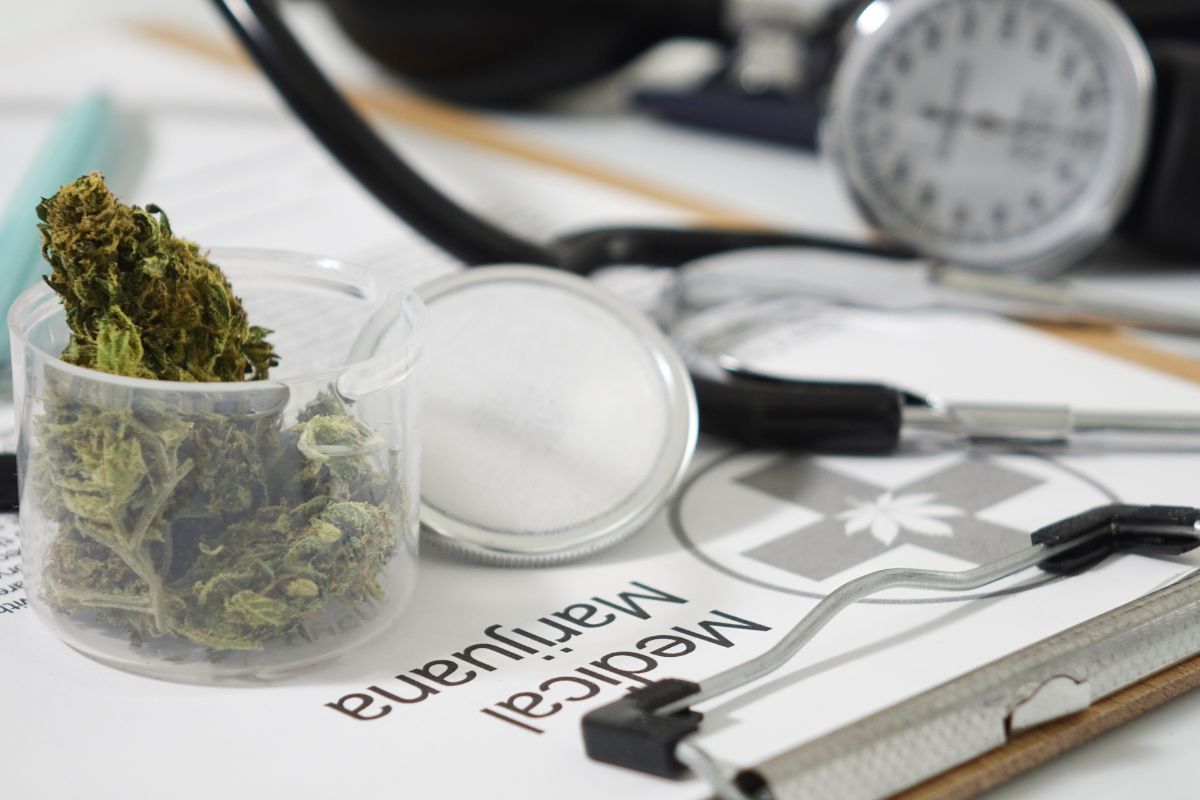 Doctor's prescription form with marijuana aside it depicting its medical use